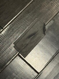 Floor tile taped down