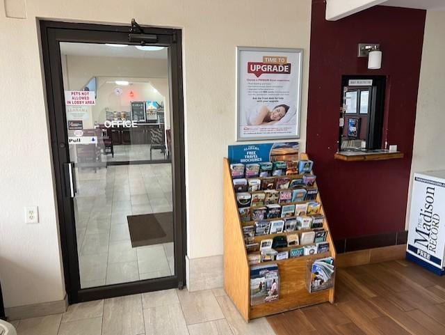 Door remains locked!!  Note plunger hook on office door which holds the sign for all guests to use night registration window except during breakfast hours.