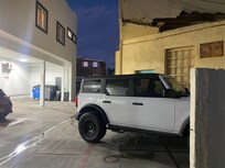 Car parked as close as possible and still does not fit