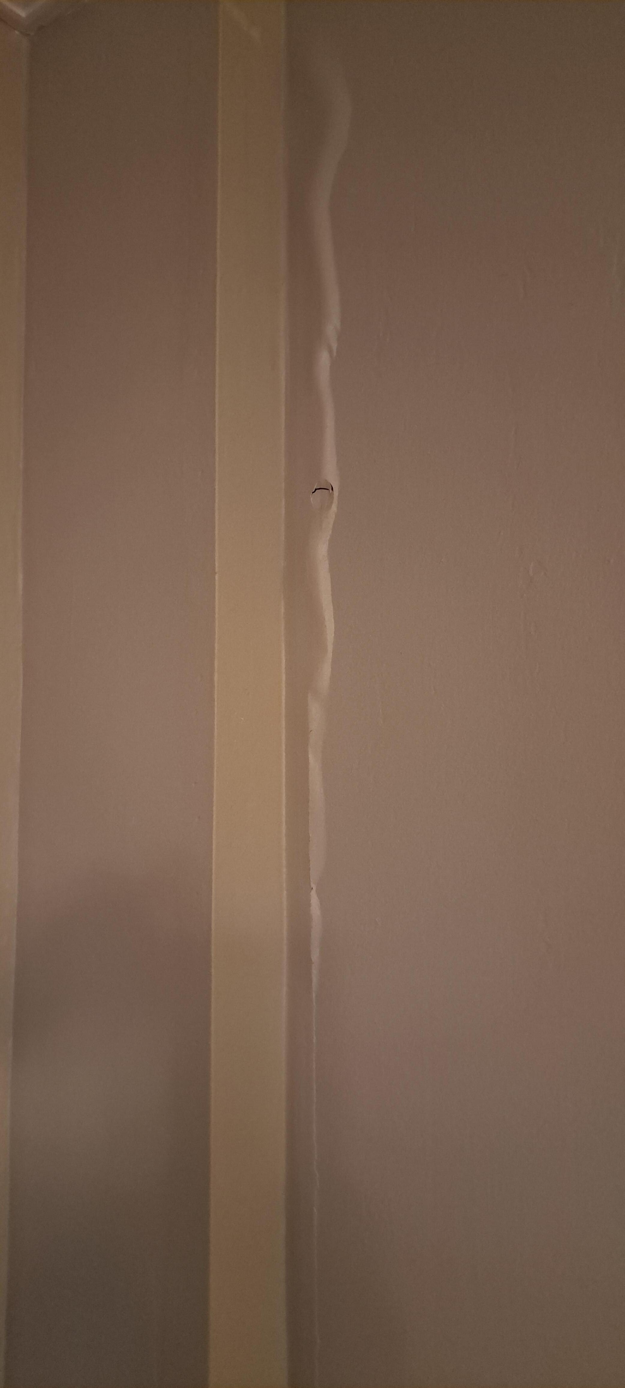Buckled wall