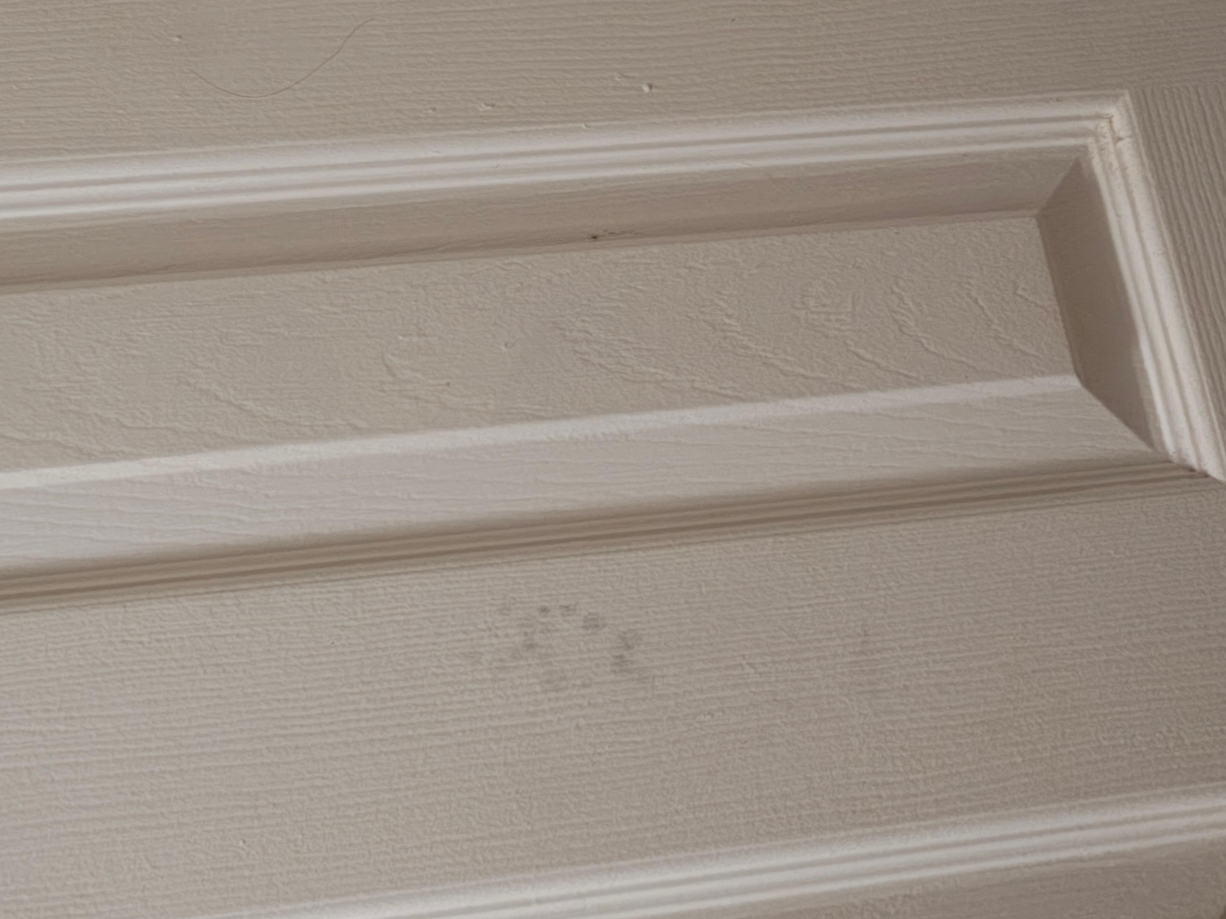 Wall has red on not sure if it blood 
