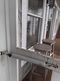 Screen door was dirty and the screen was ripped.