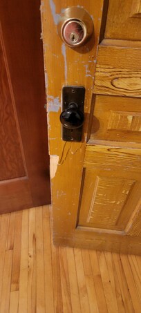 Broken door, cracked at the handle, did not latch