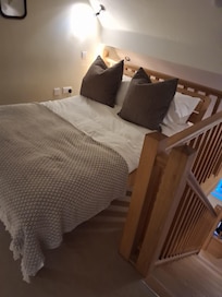 Mezzanine bedroom in loft room.