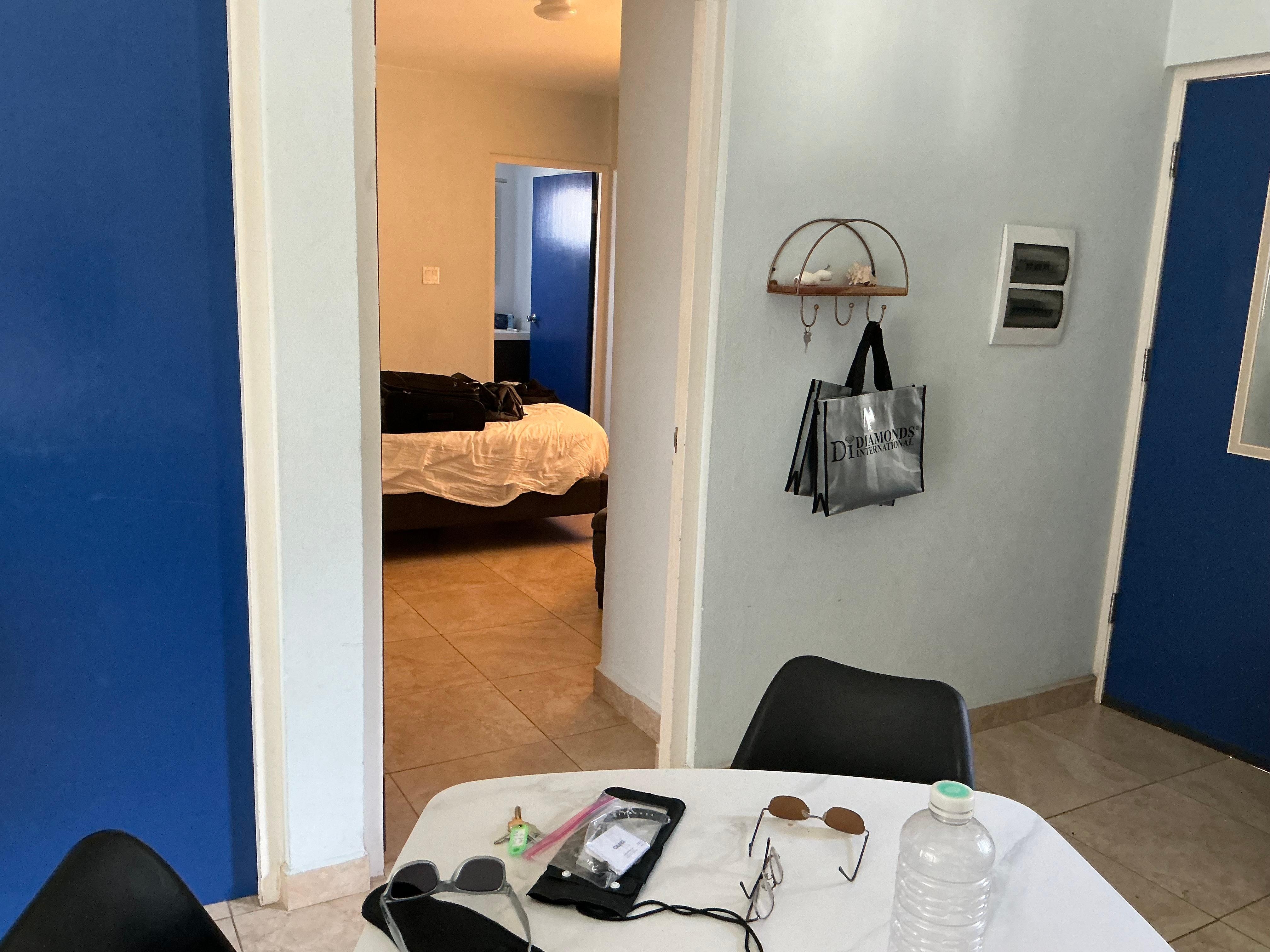 From kitchen into first bedroom and bathroom
