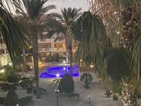 View of pool at night