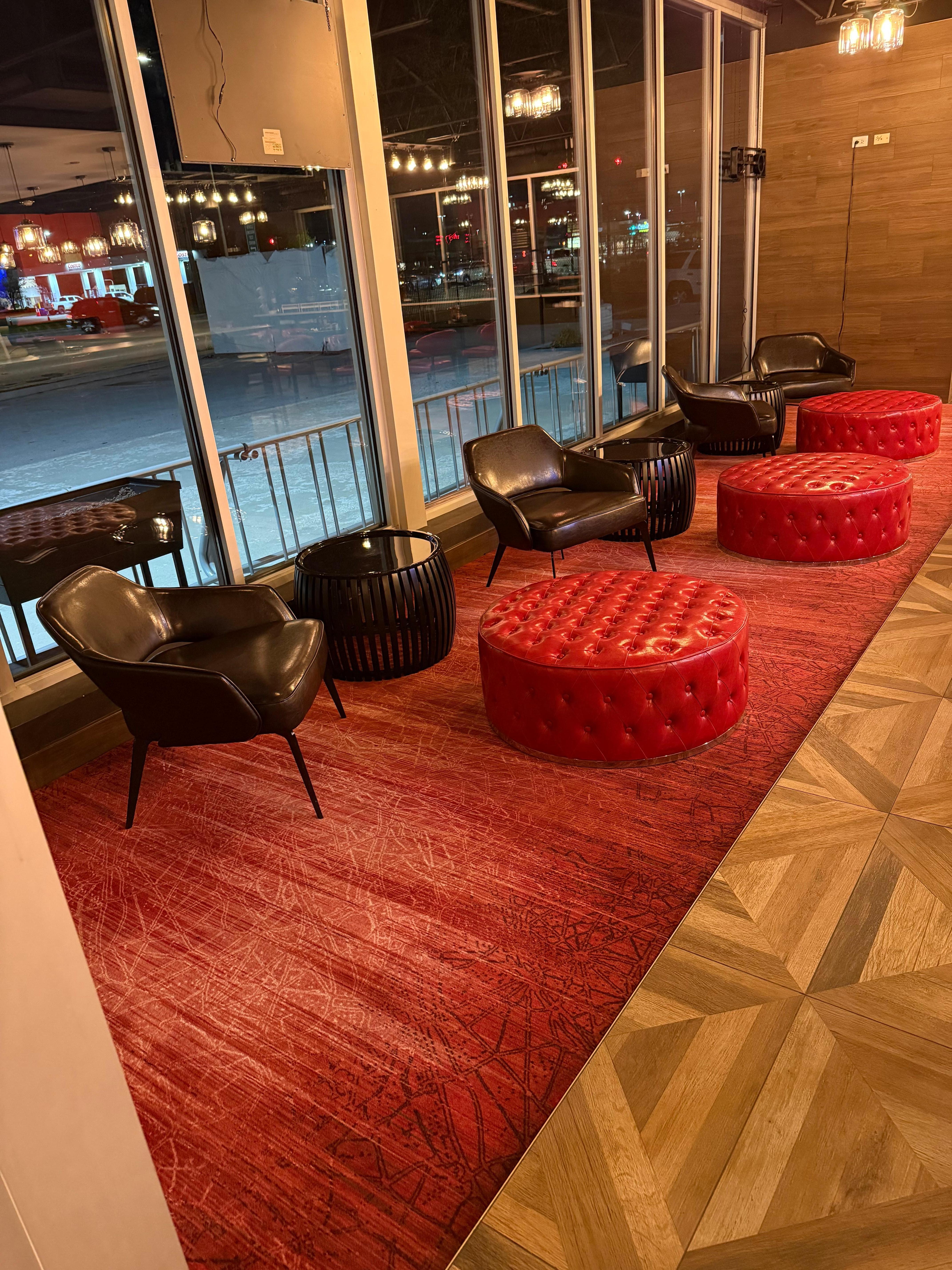 Some of the seating in the restaurant in hotel.