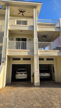 Between the condos facing the garage.