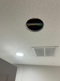 Hole in the bathroom ceiling