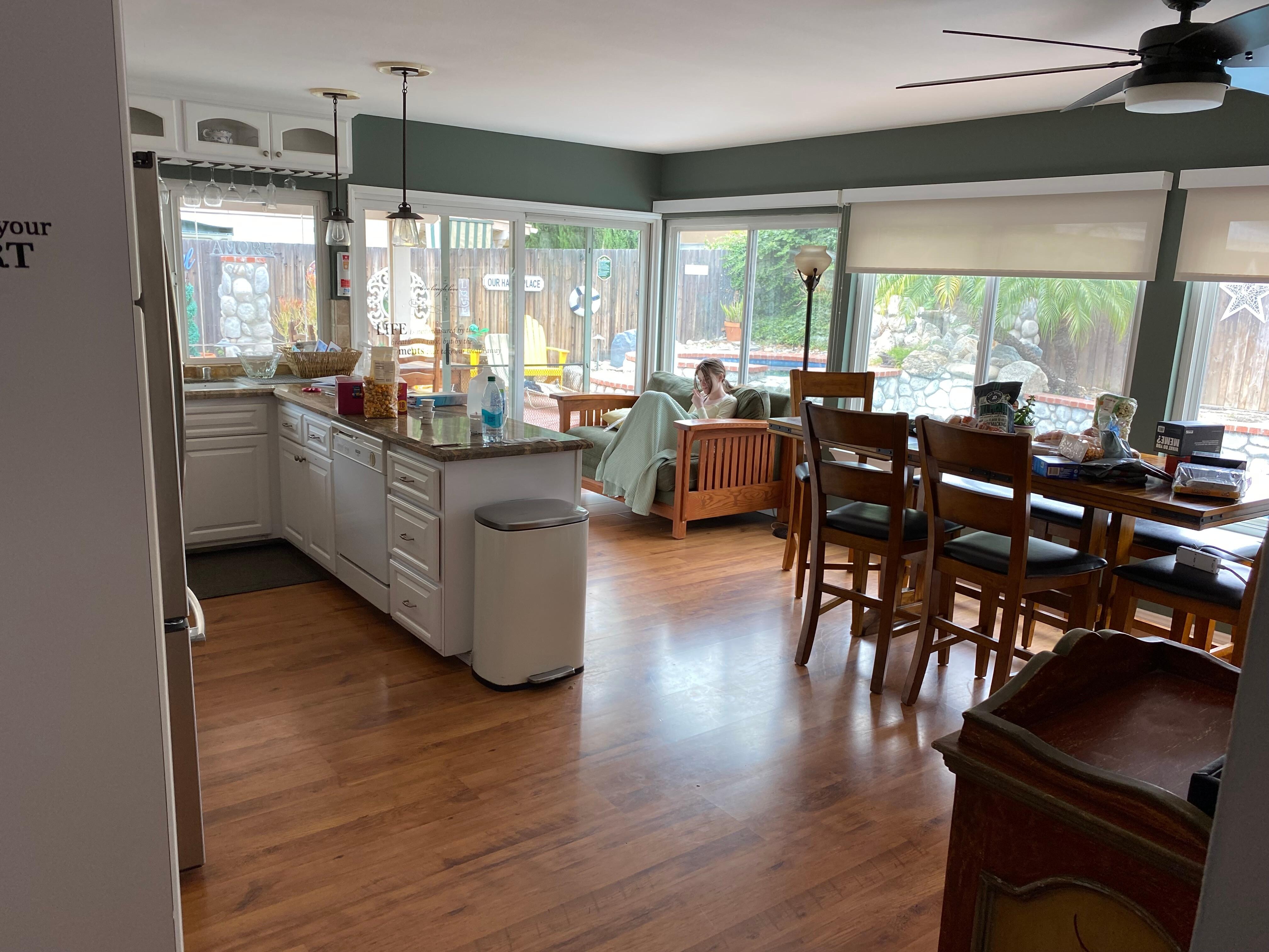 Kitchen/dining room and view of patio