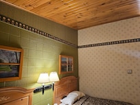 Interior of room. Decor is dated but functional