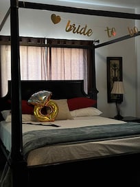 Master bedroom Bed, personal large bathroom with stand shower and separate deep tub. tv and access to patio.