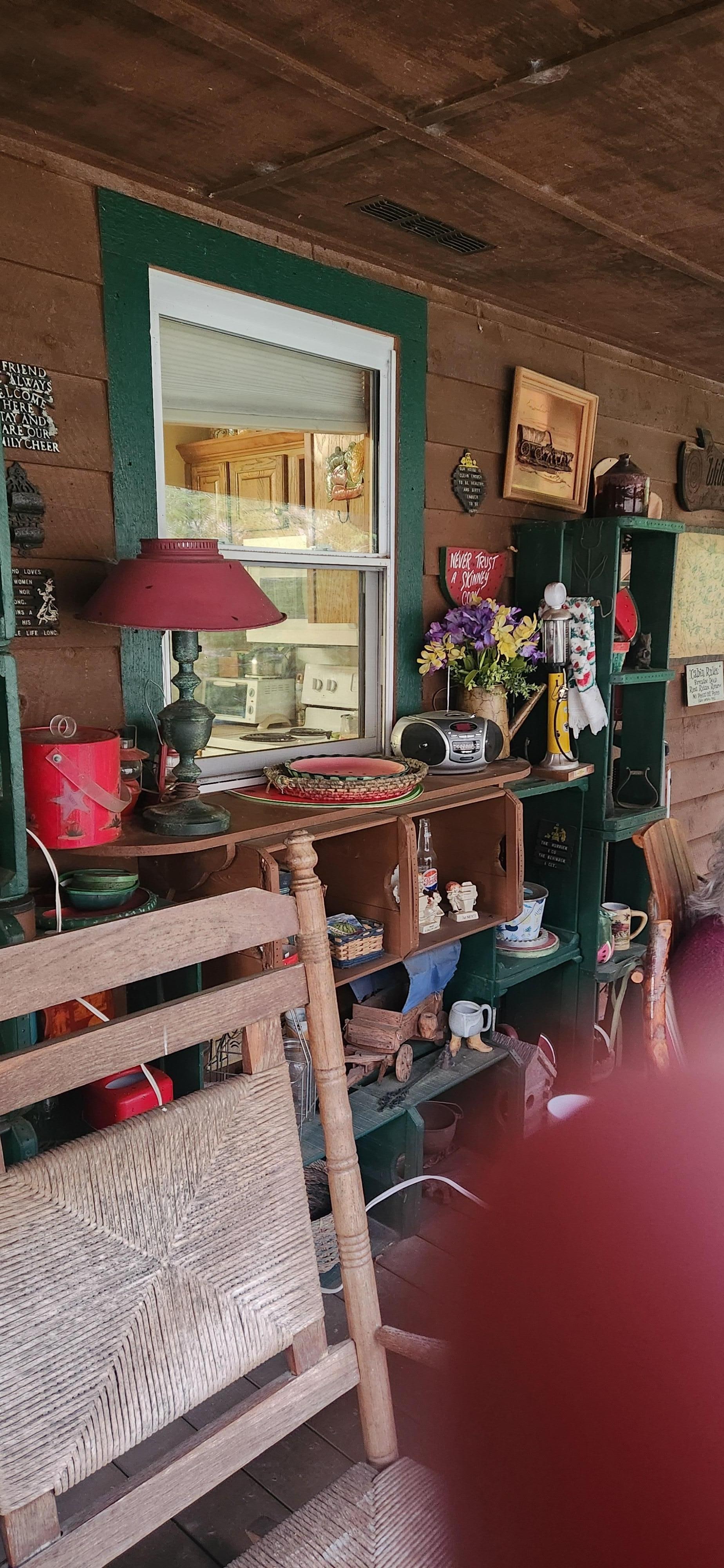 Cluttered back porch with uncleaned dirty trinkets