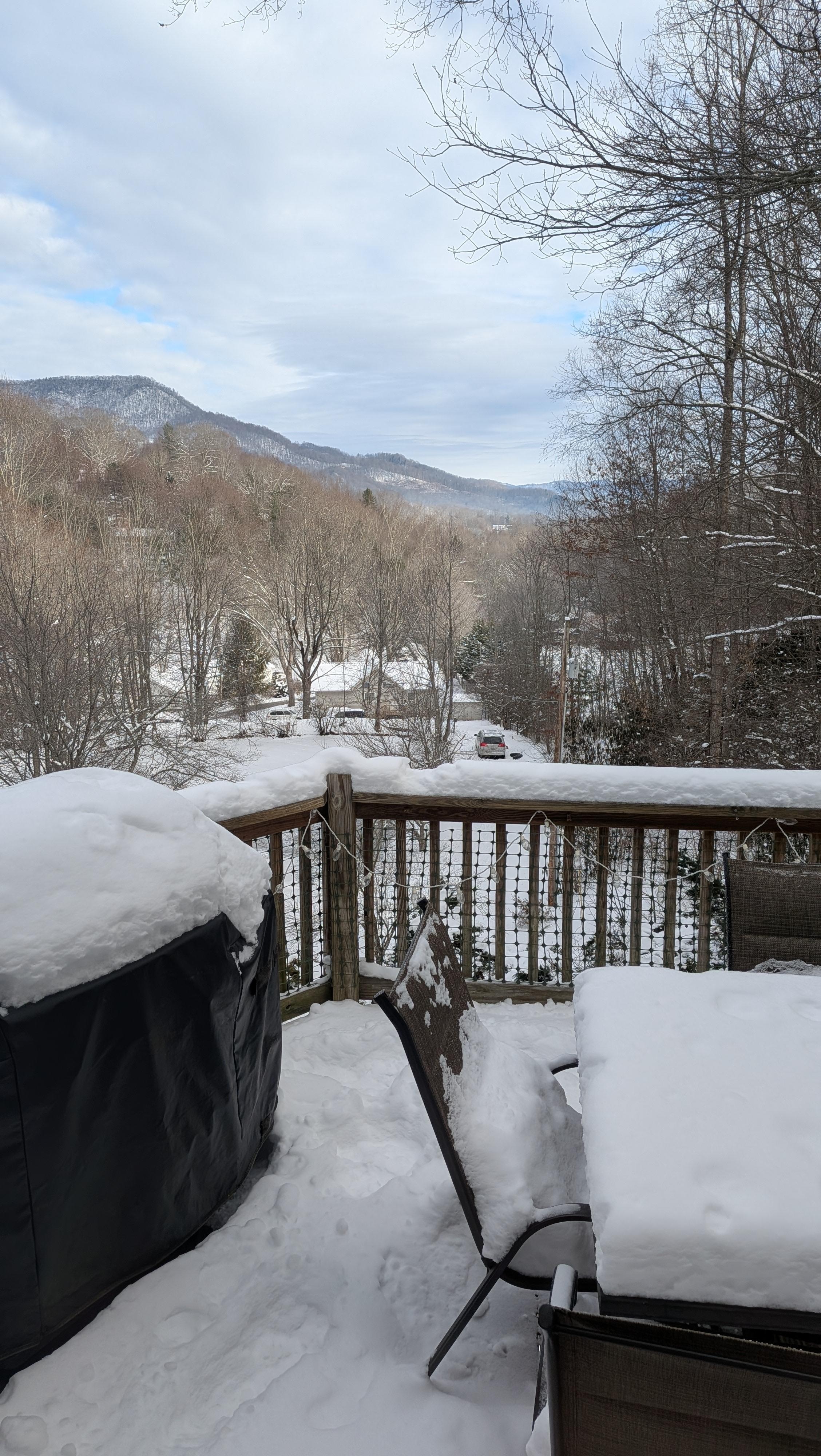 2 sets of sliding glass doors to enjoy the balcony and view