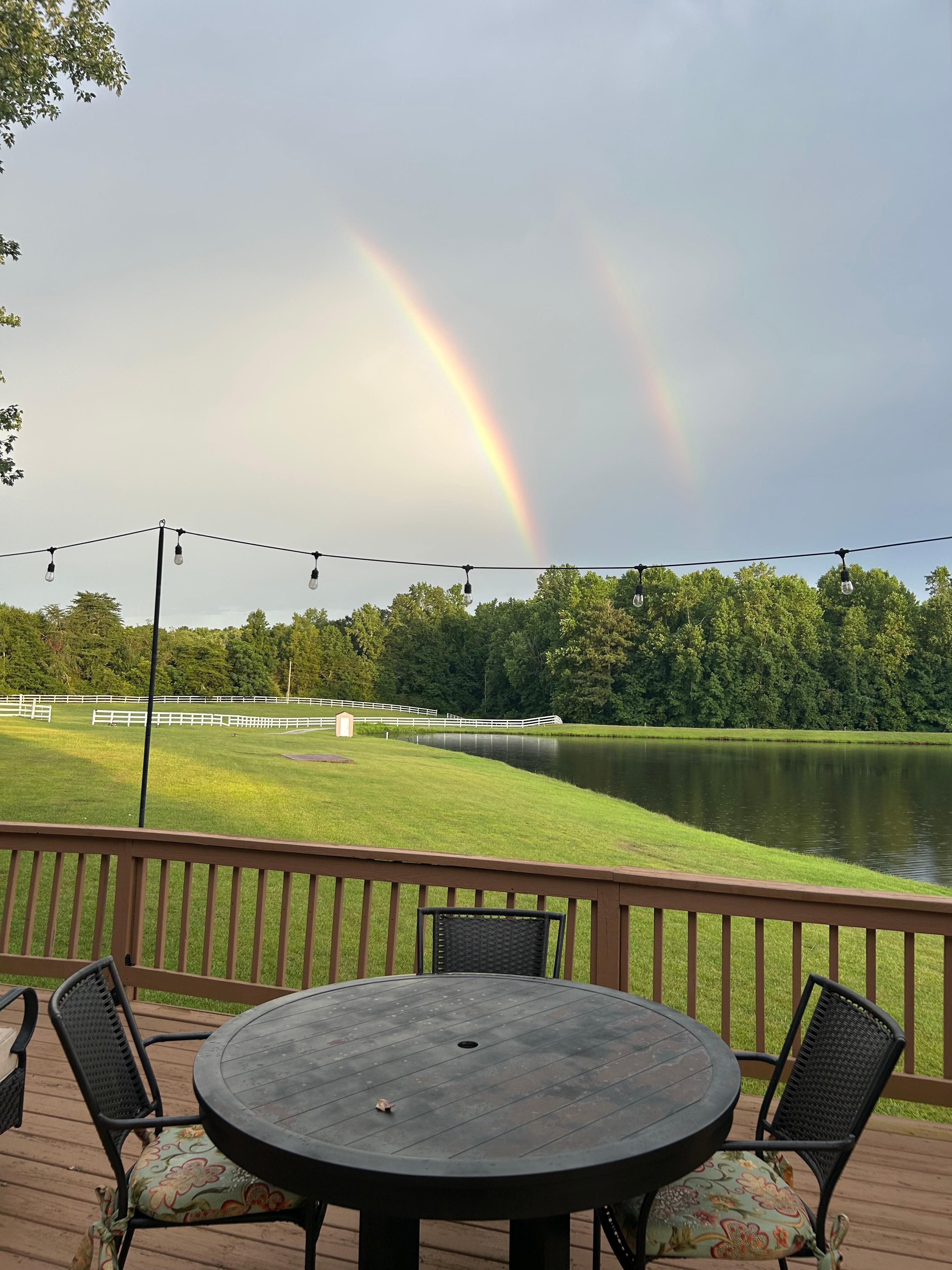 Double rainbows forming