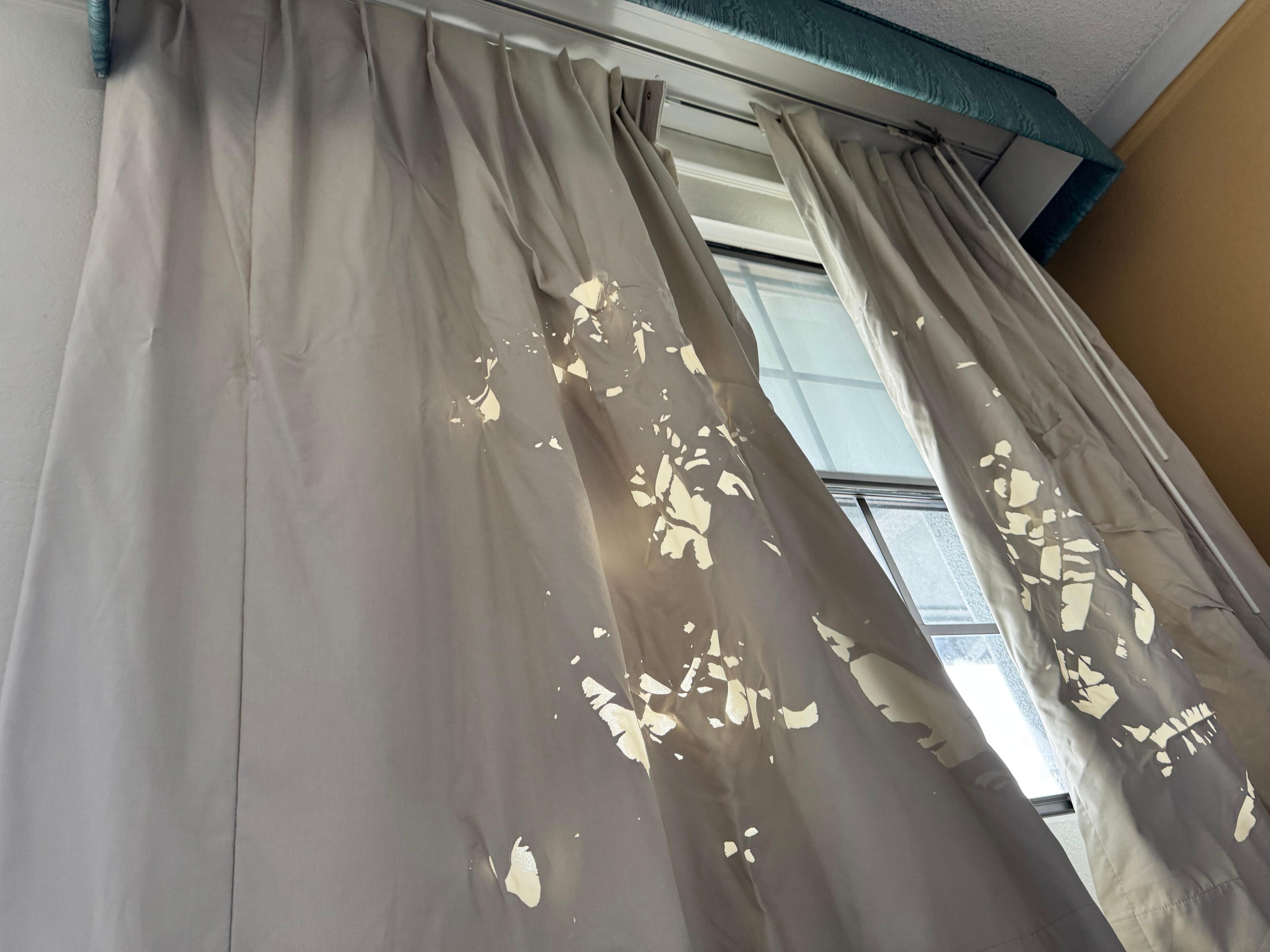 Curtains completely removed from the window covering track