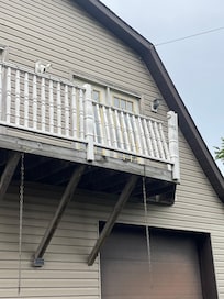 Broken railing above parking