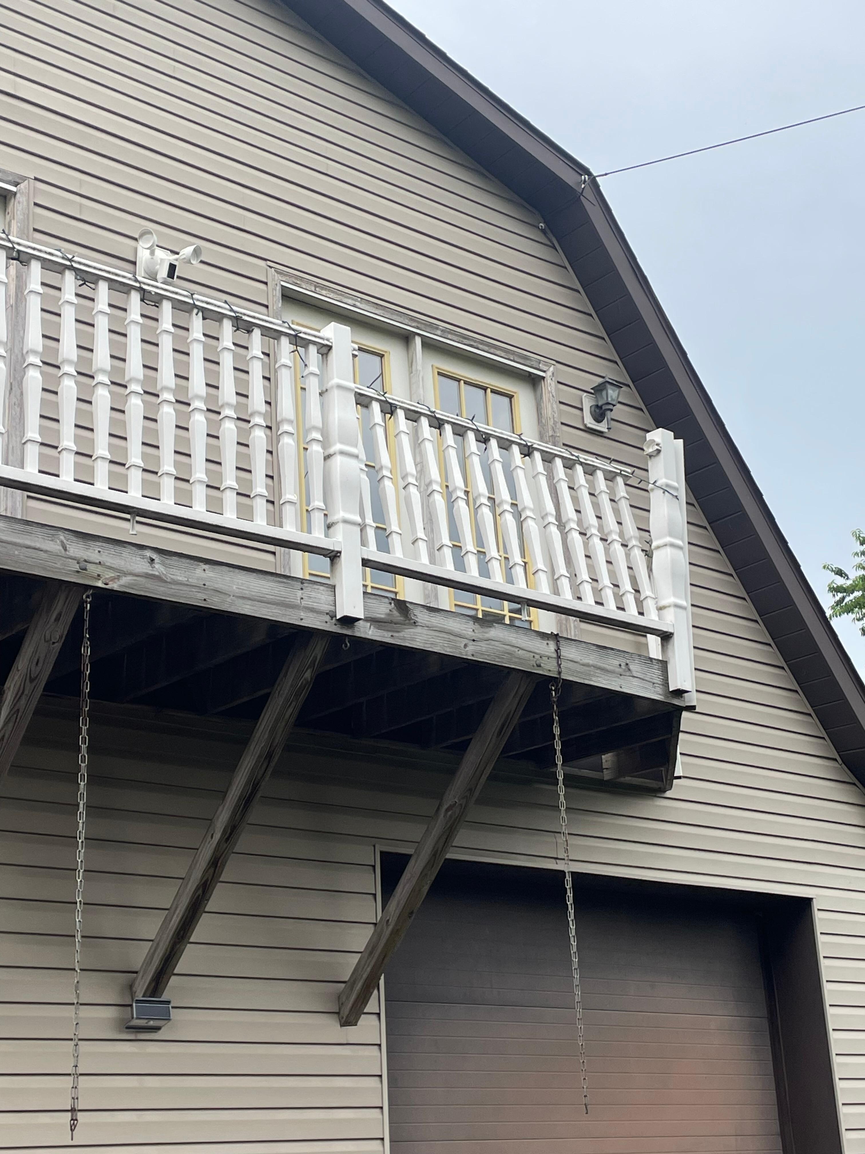 Broken railing above parking