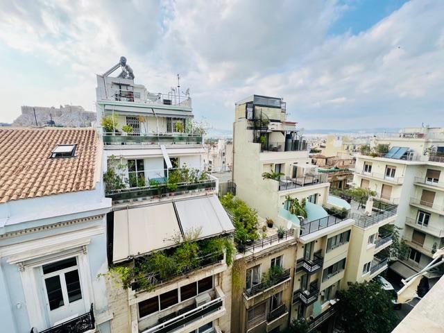 View from the wonderful balcony. You can see the acropolis in the upper left hand corner.