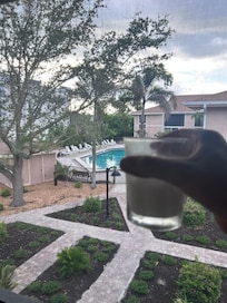 View from the screened in porch overlooking the pool!