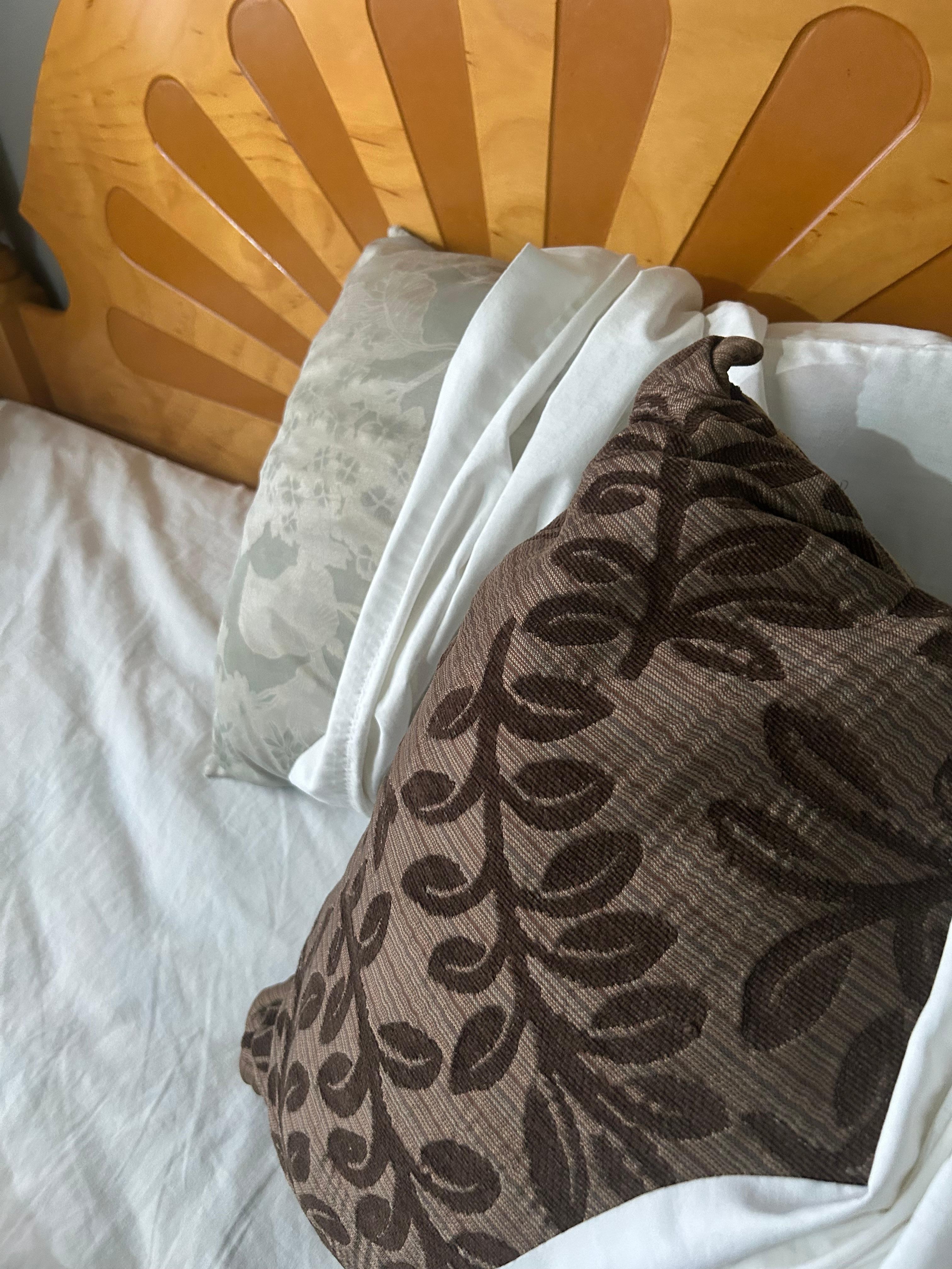 Old couch cushion as a pillow.