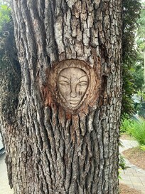 Tree Spirit located on Village Inn property.