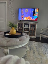 The living room, we enjoyed a bit of Friends while staying.
