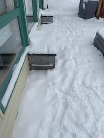 The bedroom windows opened up under these benches on the back deck. They were nailed shut.