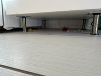 Dirt underneath kitchen furniture