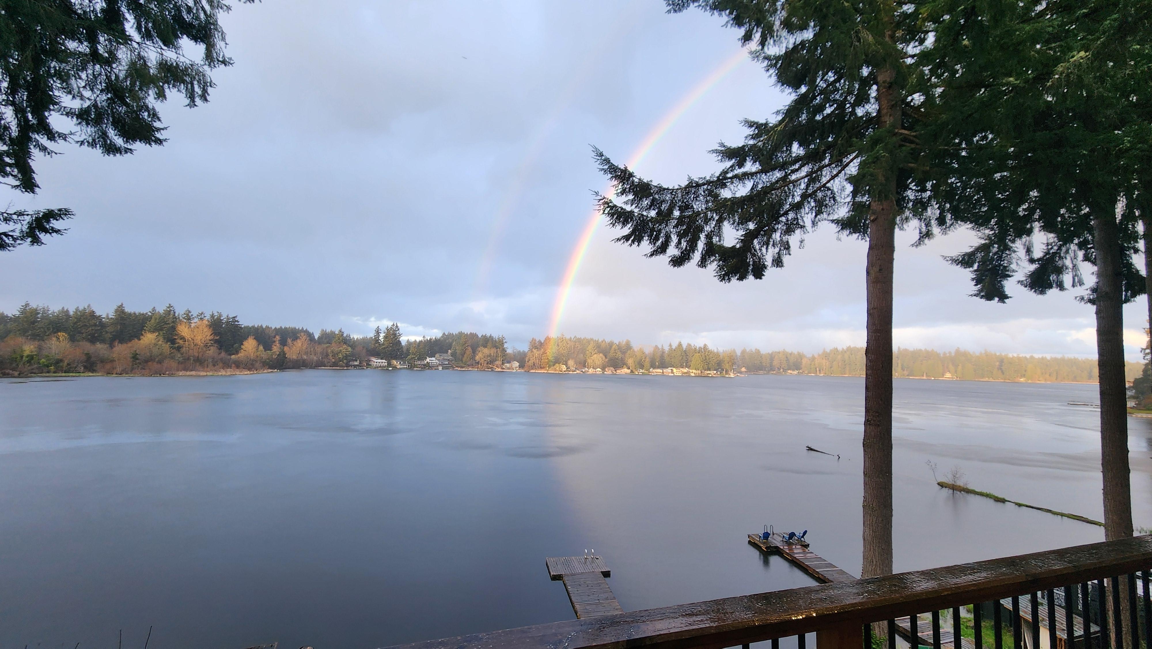 A brilliant rainbow after a short shower.  Didn't stop us from relaxing in the hot tub.  The patio umbrella over the hot tub was a great addition, making it enjoyable no matter the weather!