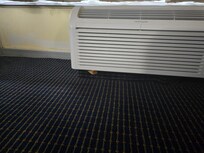 There is a door stopper holding the AC