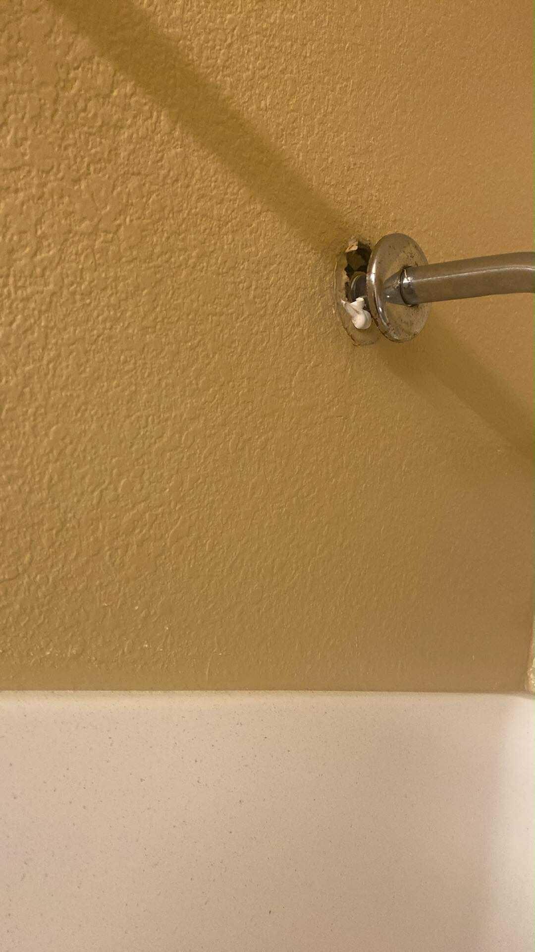 Damage to the shower wall