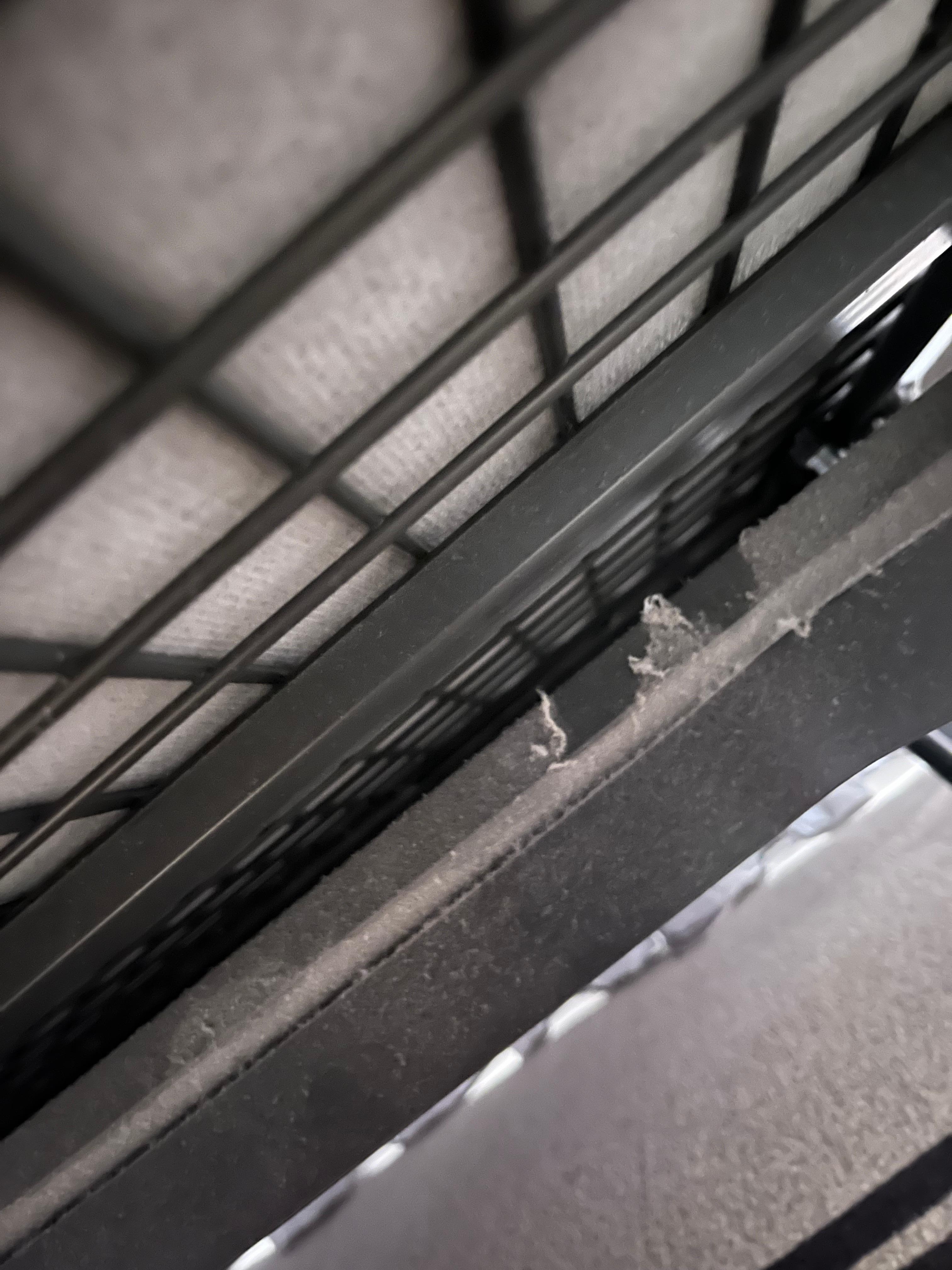 Under sofa bed (dropped pen & had to go under to find it)