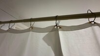 Rusty metal shower curtain holder