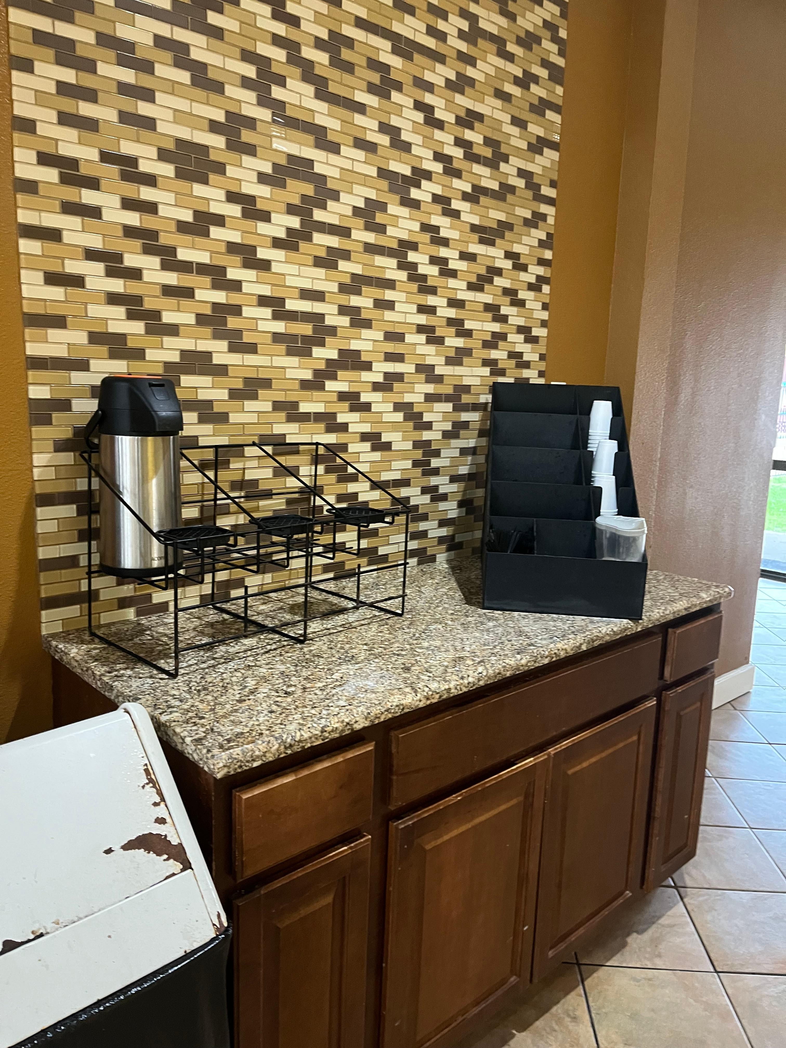 Coffee until 9; no coffee in the room as advertised.