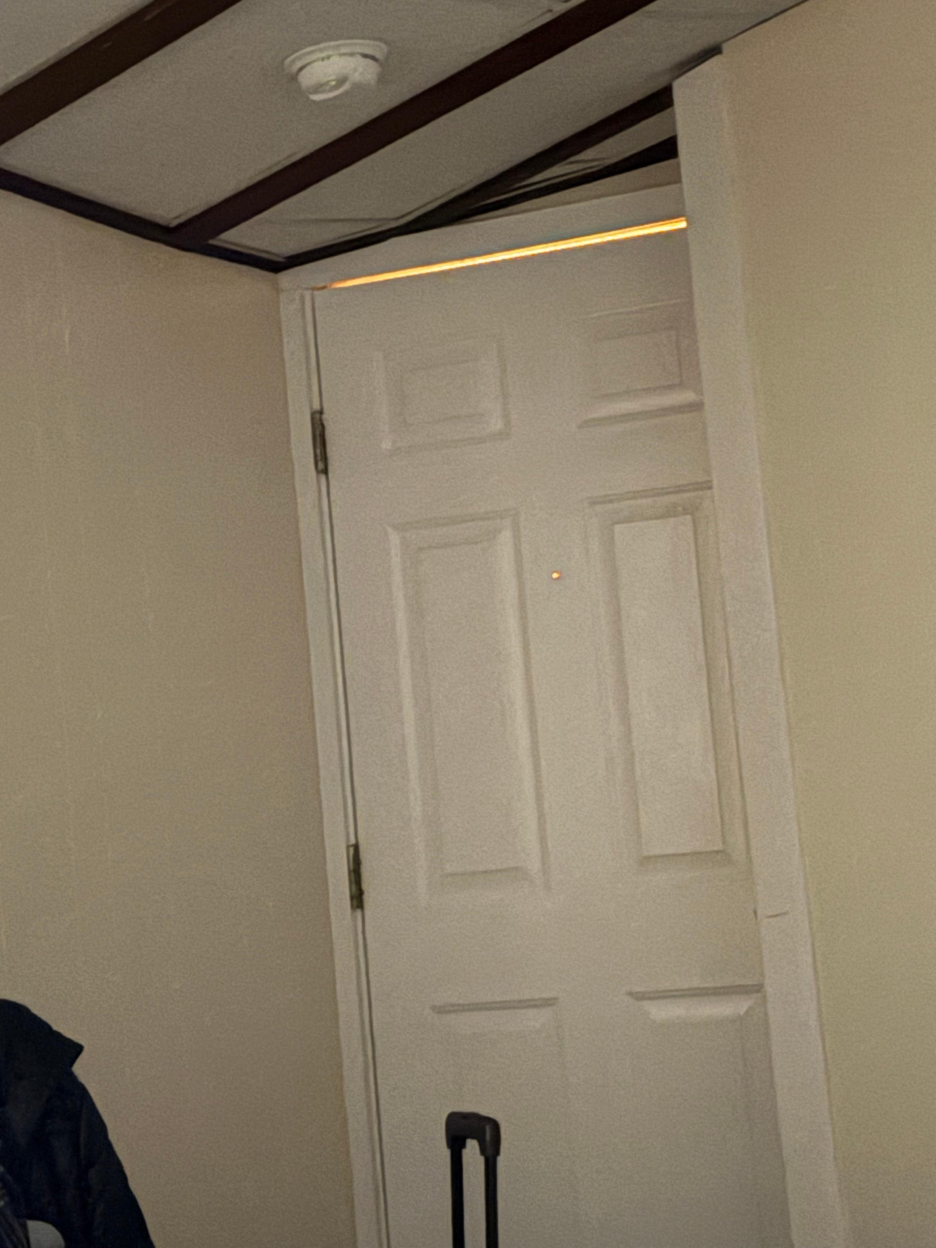 Light shining through door at night