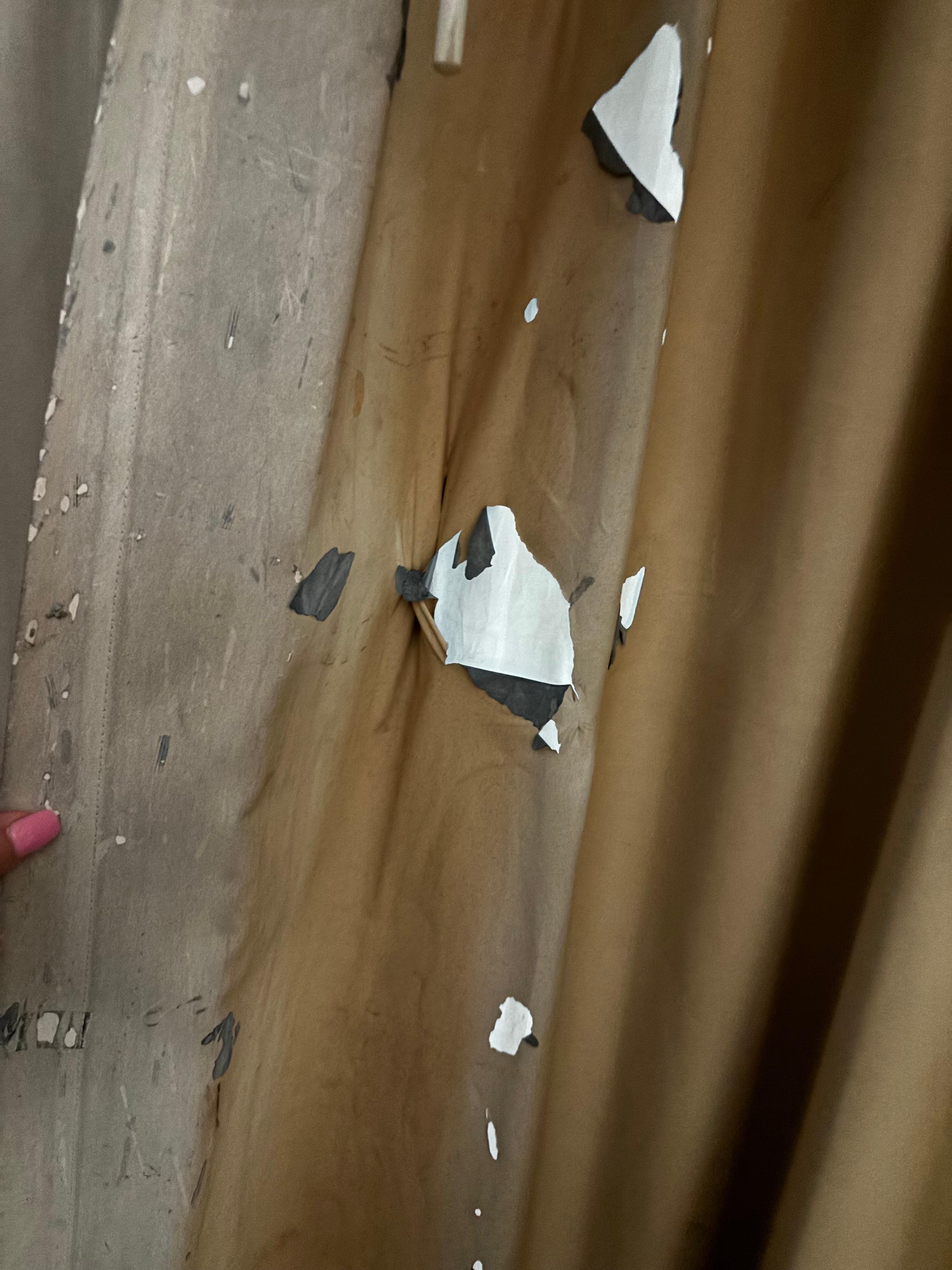 The room darkening drapes. 