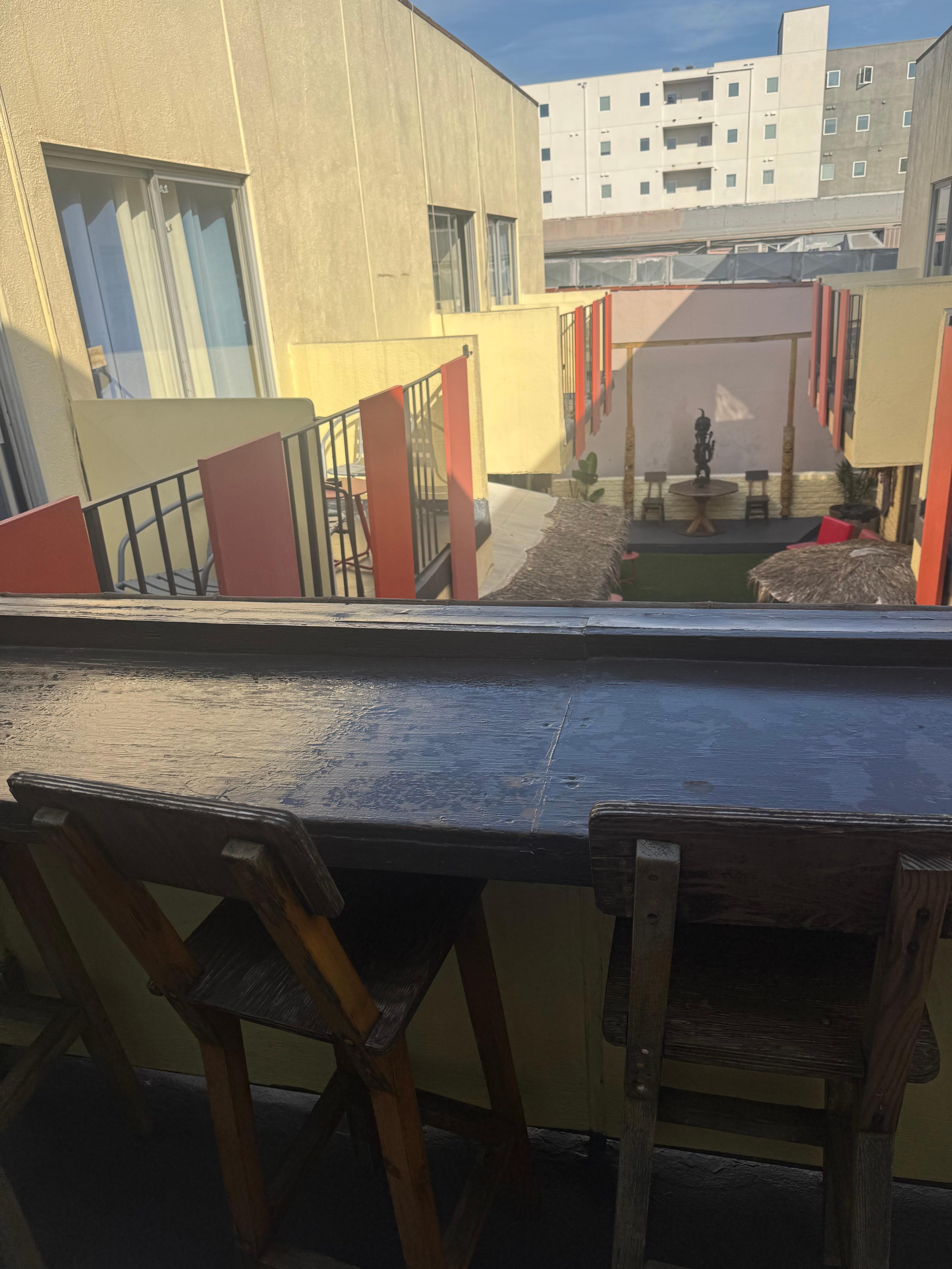 Common outdoor area and sitting from second floor. 