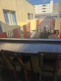 Common outdoor area and sitting from second floor.