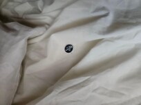 Beer cap in son's bed roll after cleaners changed them out