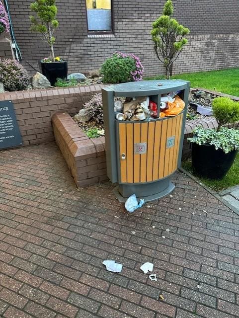 Front Entrance: Not a great way to great visitors @ 15.35hrs. Litter still there the following morning. I won't be staying at the Hilton again. 