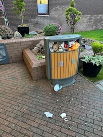 Front Entrance: Not a great way to great visitors @ 15.35hrs. Litter still there the following morning. I won't be staying at the Hilton again.