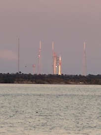 Artemis II zoomed view from behind the parking lot