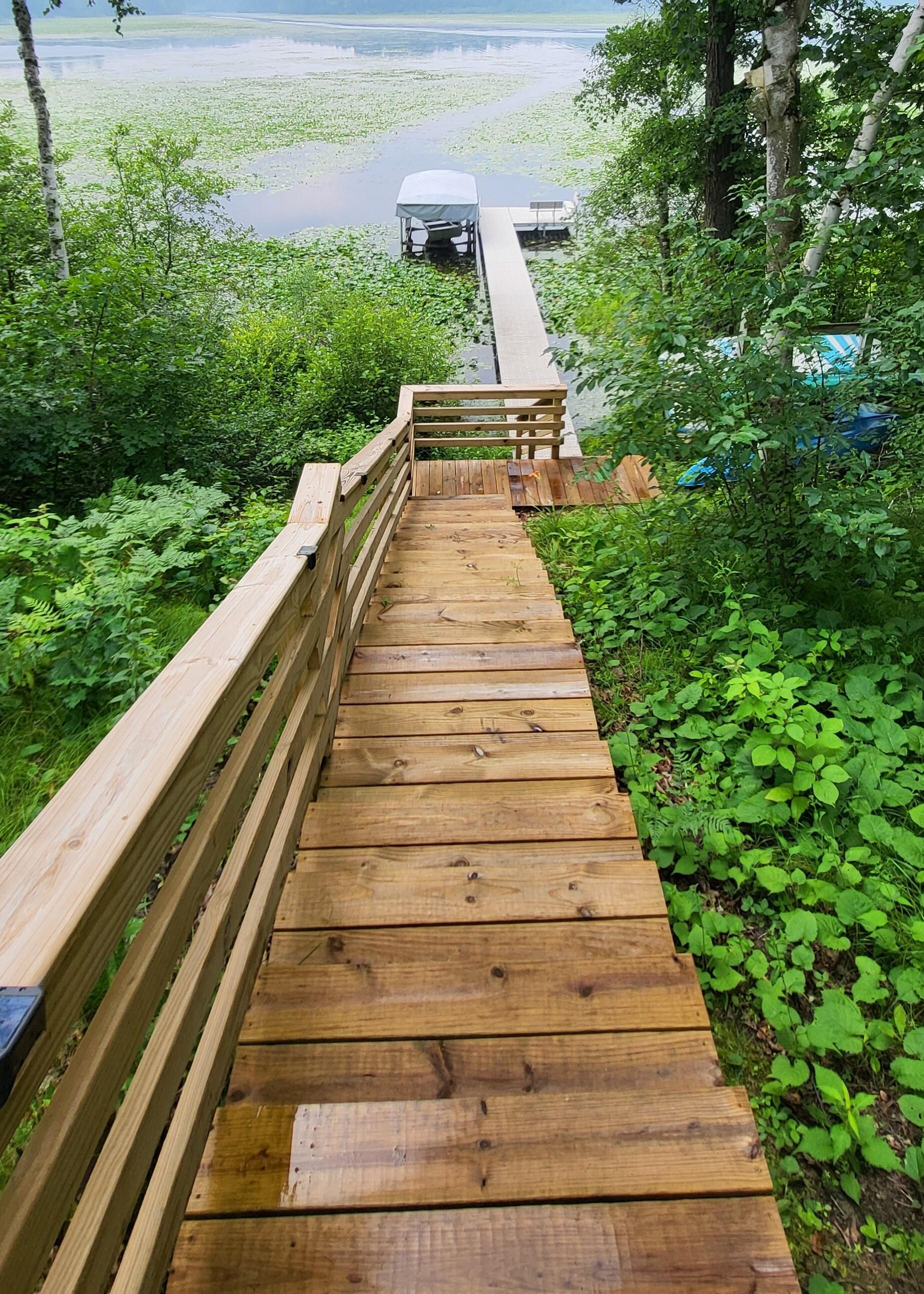 Stairway to dock, lit at night