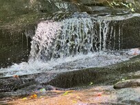 Waterfall at bottom of trail.