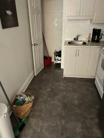 Dirty kitchen garbage on the floor dirty counters
