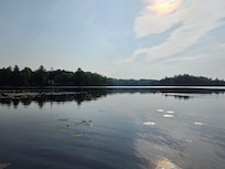 On a calm morning, the lake was lovely.