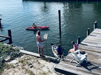 The girls taking out the kayaks (which we brought with us) one afternoon.