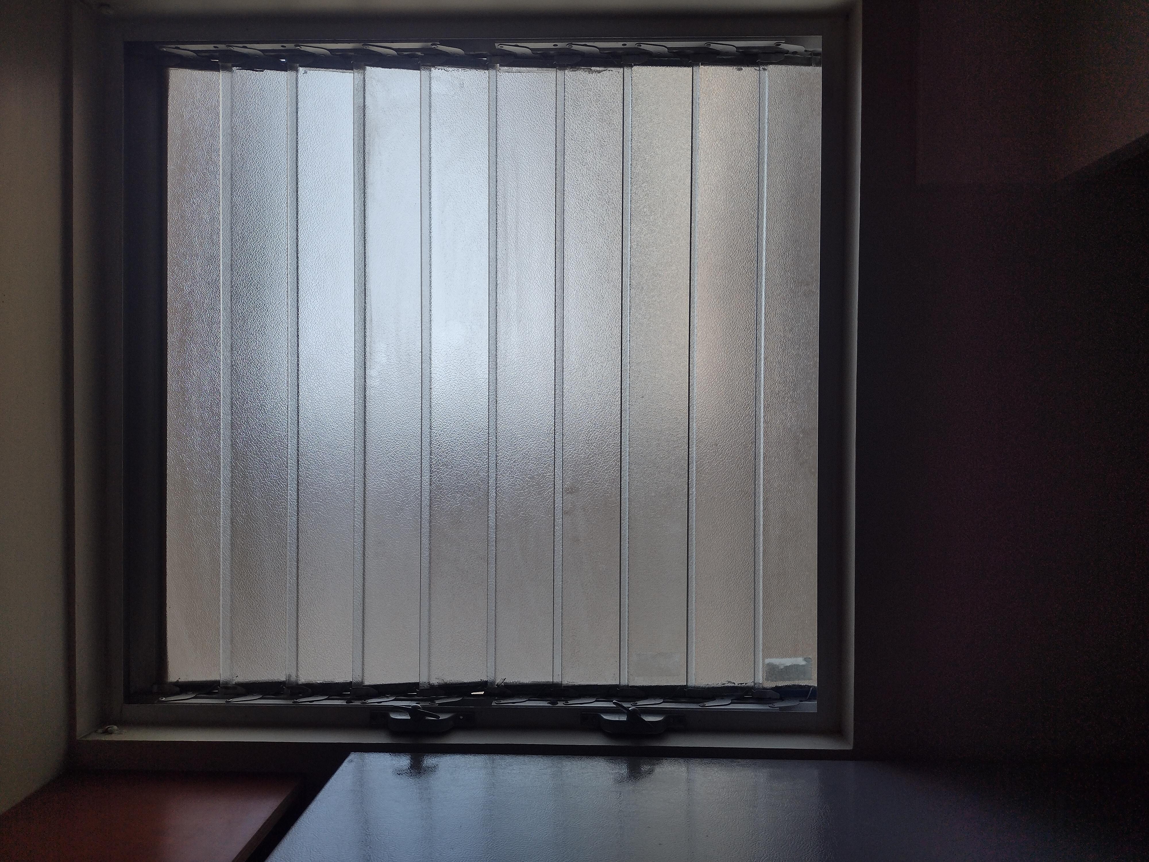 No screens on any of the windows and no screen on the front door. I can't remember if there was one on the slider.