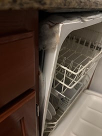 Dishwasher falling out of the wall